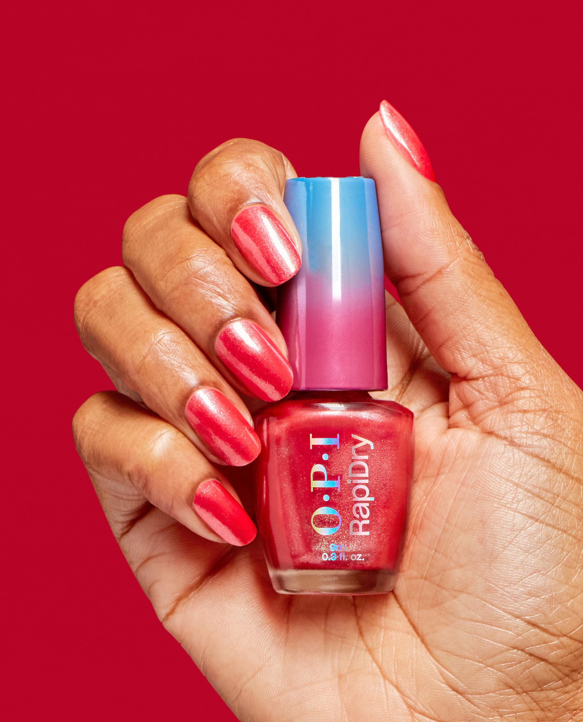 OPI Fuego On-the-Go RapiDry Quick-Dry Nail Polish Hand and Bottle