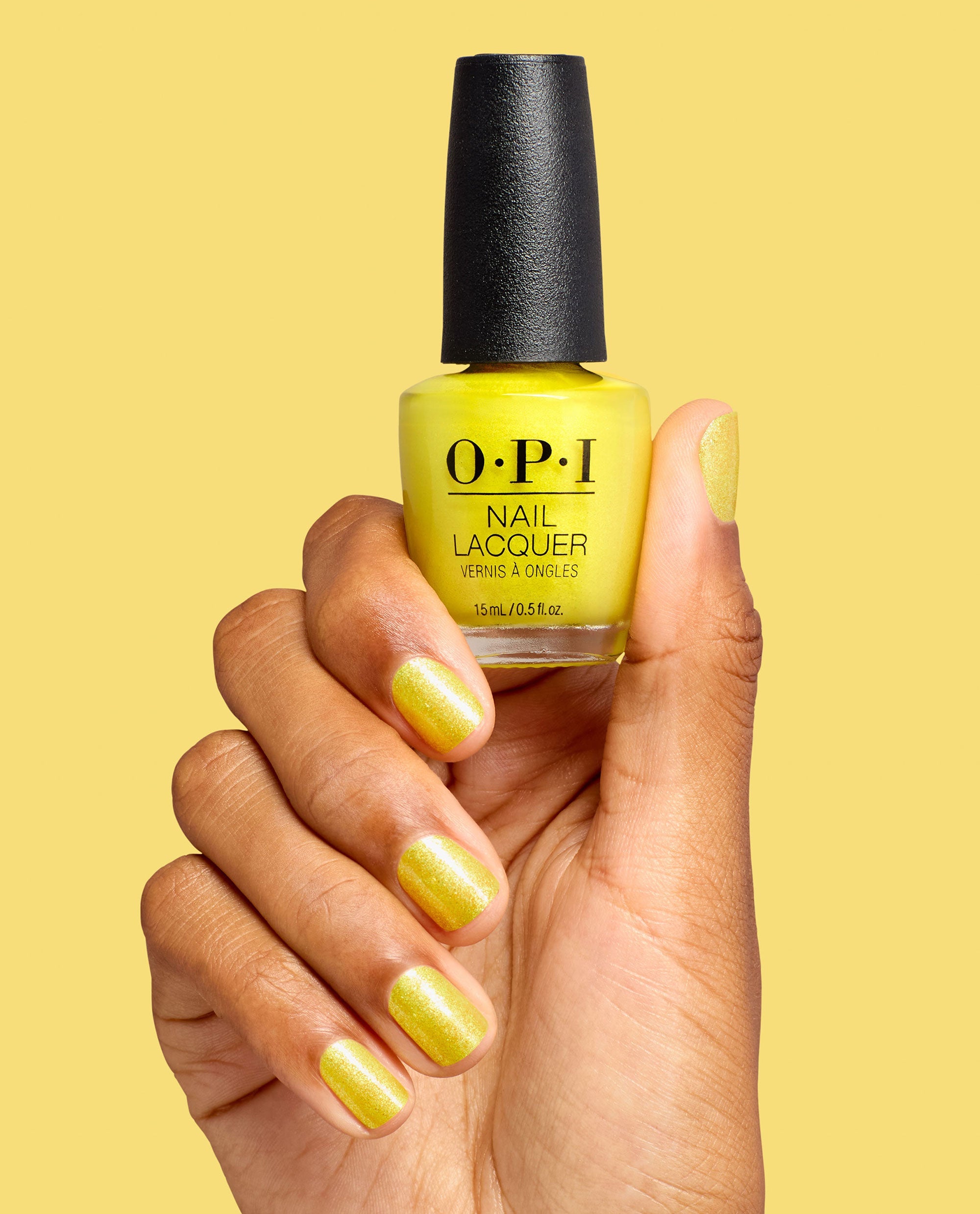 Paintin' on Sunshine! Vivid Yellow Shimmer Nail Polish Hand and Product