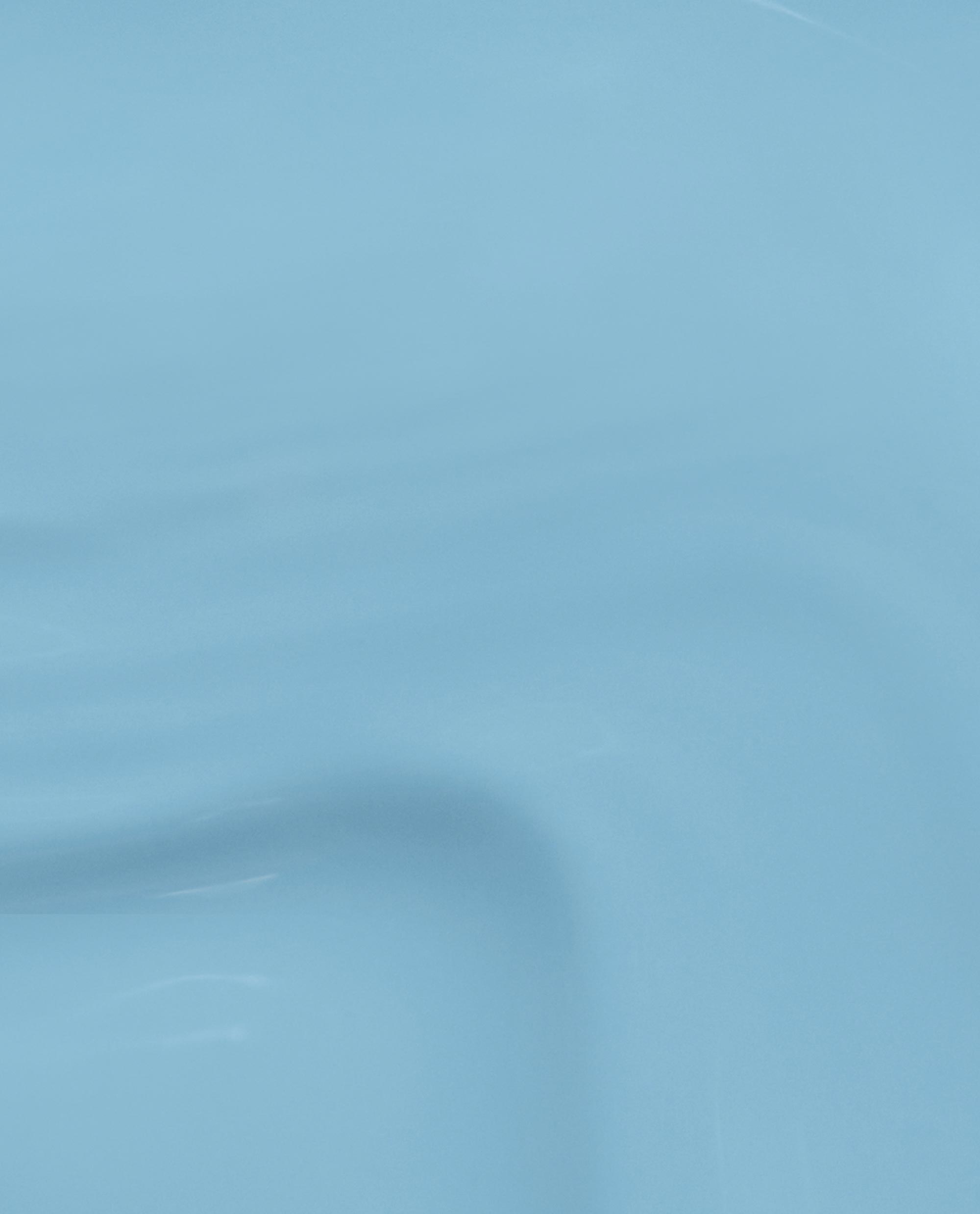 Close-up swatch of OPI Snap Your Fingers RapiDry™ in a smooth, glossy pastel blue finish, showcasing the nail polish texture and shine for an OPI nail polish gift set product detail shot.