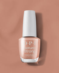 OPI Nature Strong Vegan Nail Lacquer in Rooting For Hue, a trending peachy nude nail polish with a white cap, standing on a warm terracotta background.