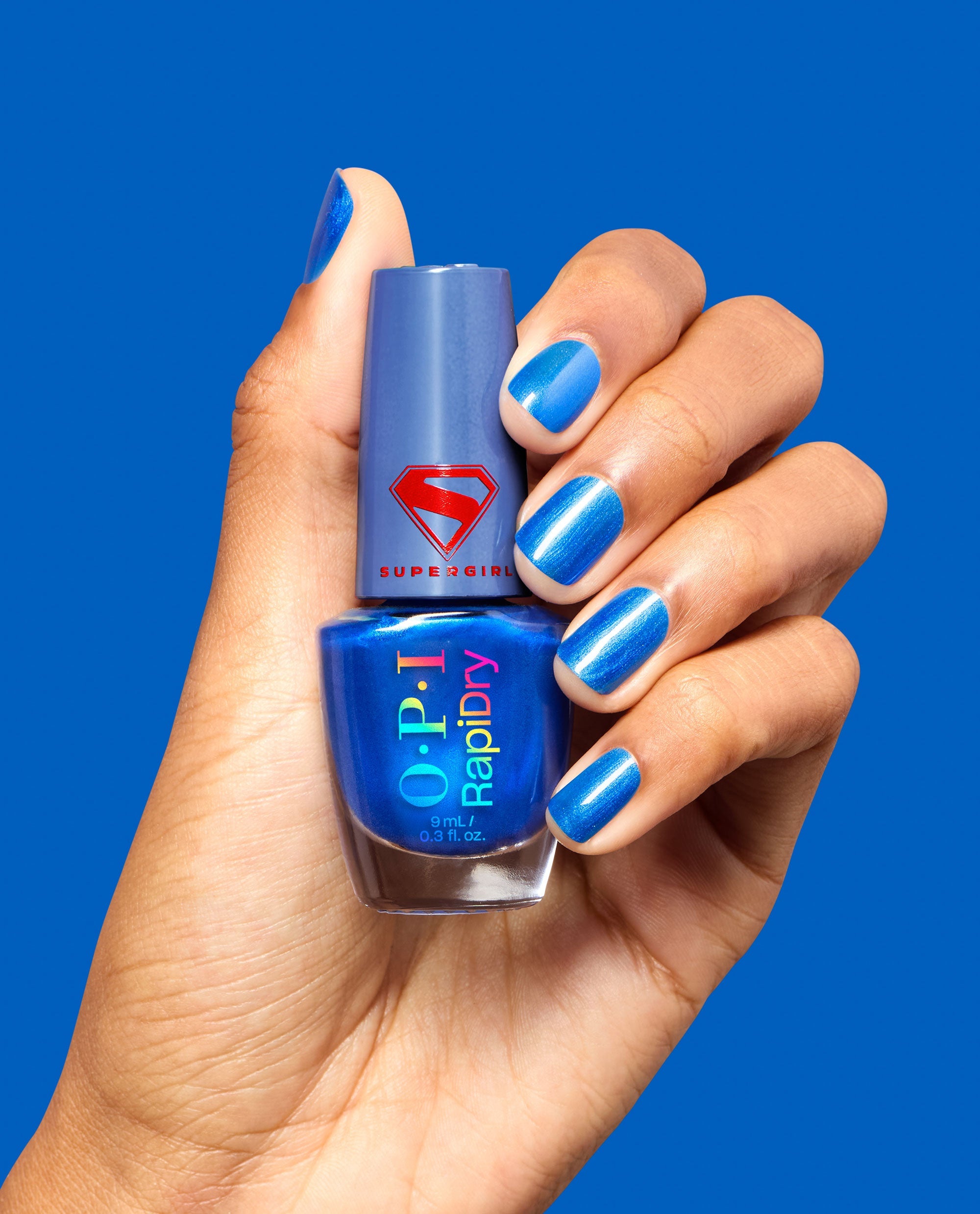 Sklarian Sapphire Blue Shimmer Quick-Dry Nail Polish Hand and Bottle
